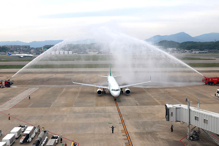 A Spring Airlines plane in a water salute in Fukuoka, Japan.