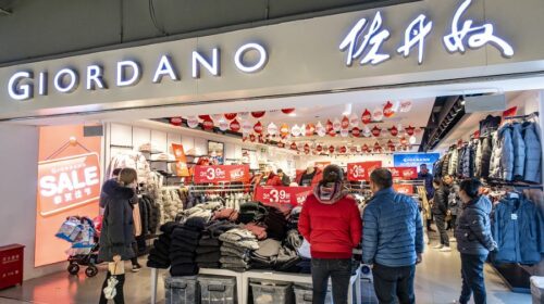 Giordano issues profit warning
