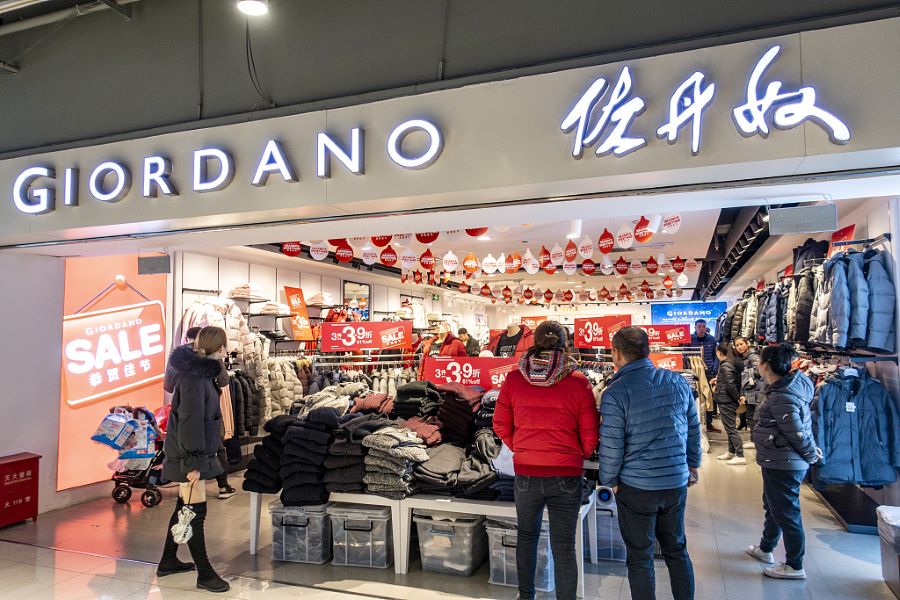 Giordano issues profit warning