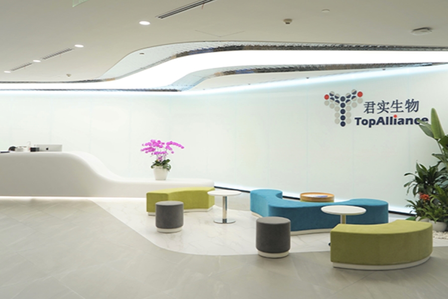 The drug maker boosted sales of its core anti-cancer product in the first half of the year and reined in its research budget under a reform-minded CEO, but revenue momentum lags the pace of leading rivals.